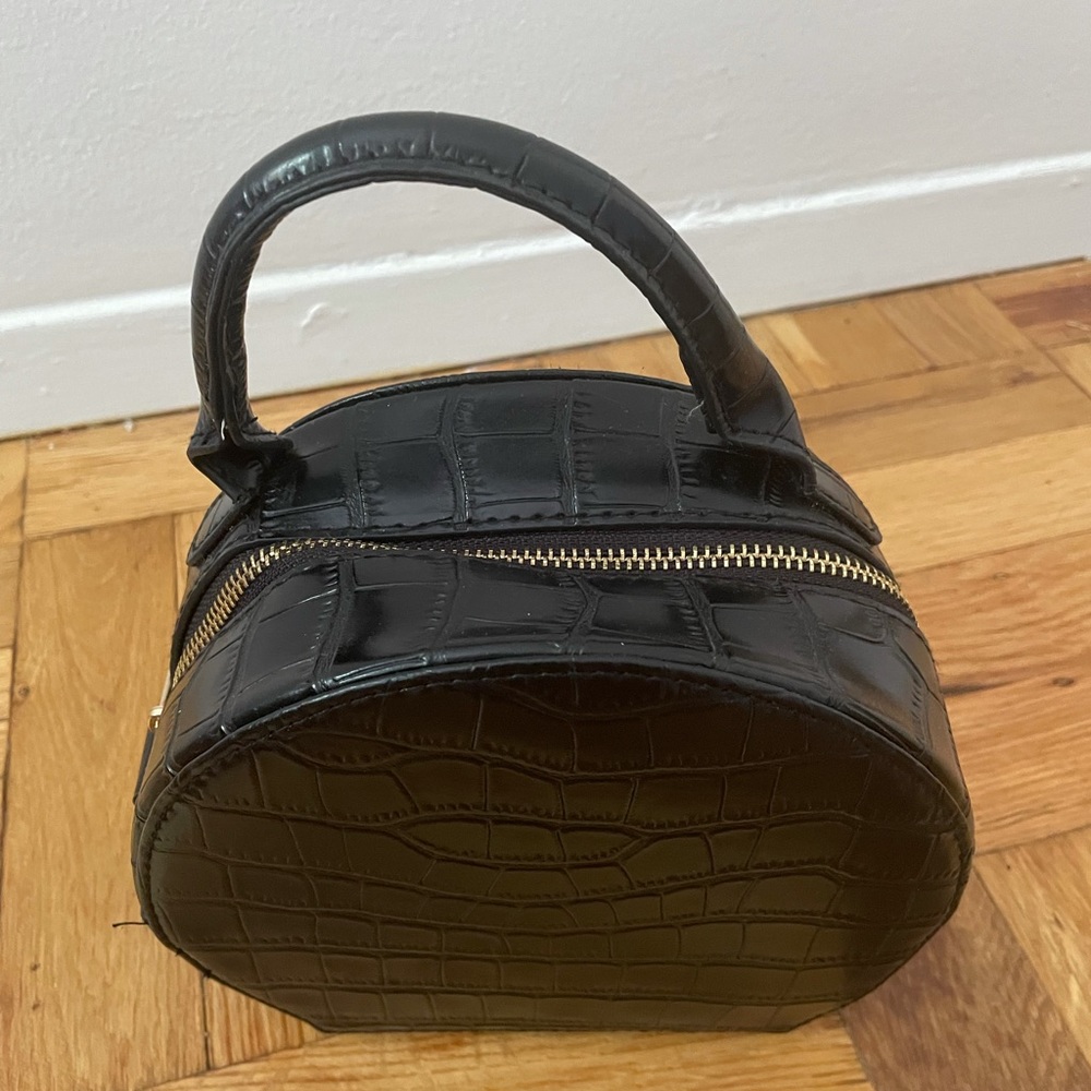 Round faux croc bag